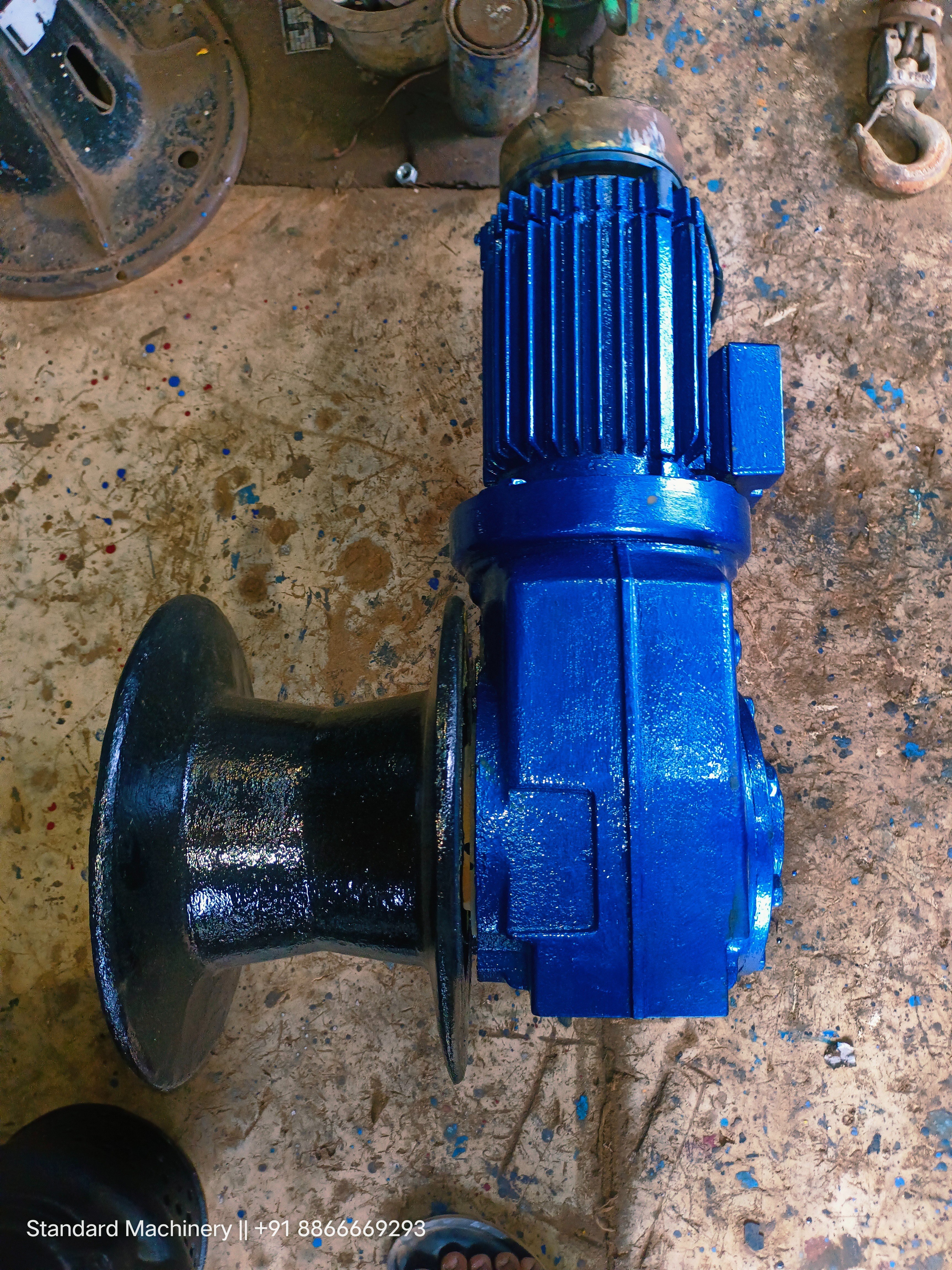 2 HP SEW electric capstan winch with black warping head, blue right-angle gearbox and steel base, 18 RPM, Standard Machinery