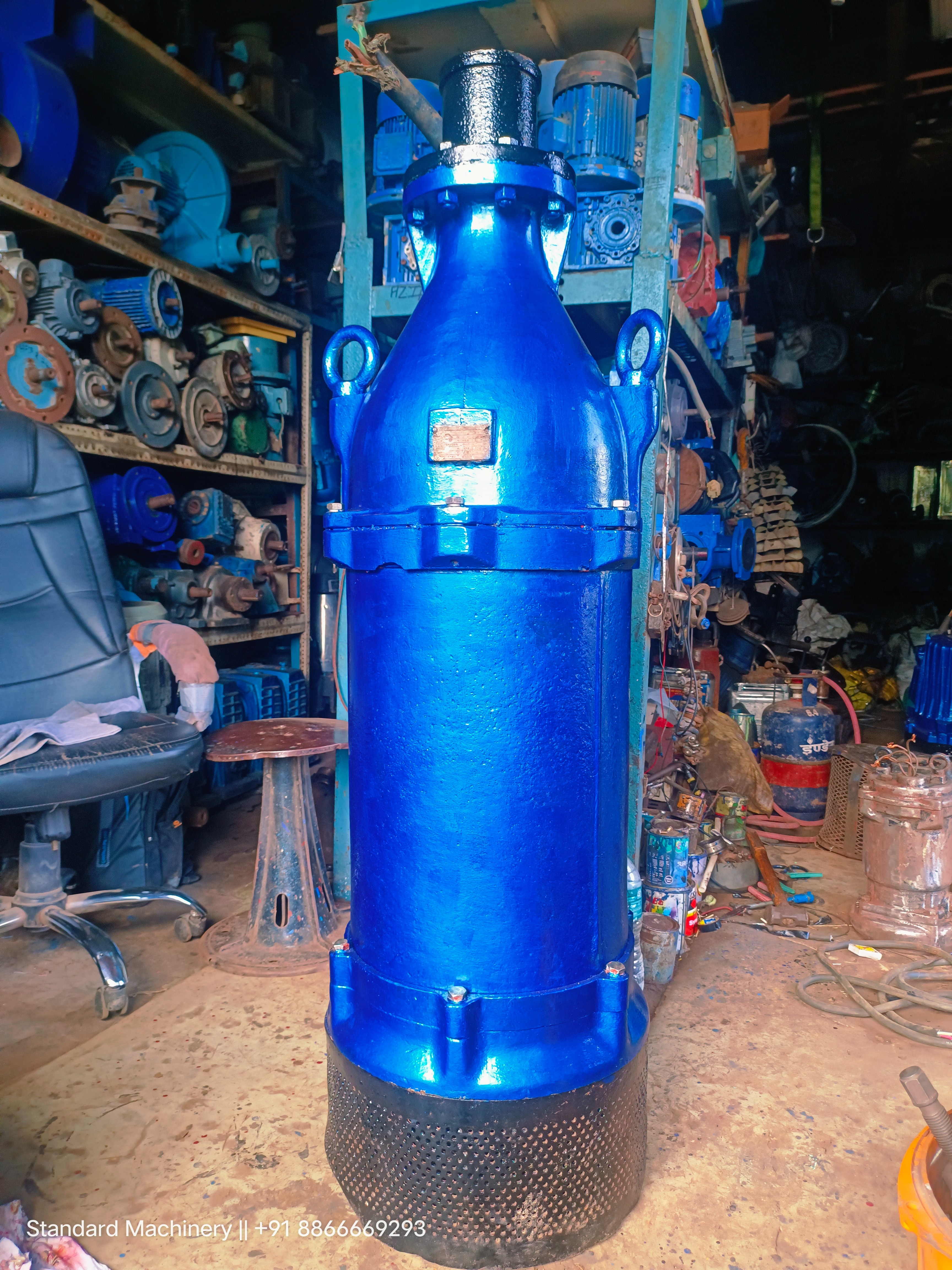 Tsurumi 22 kW 4 inch blue submersible dewatering pump with top discharge, lifting eyes and bottom strainer, Standard Machinery