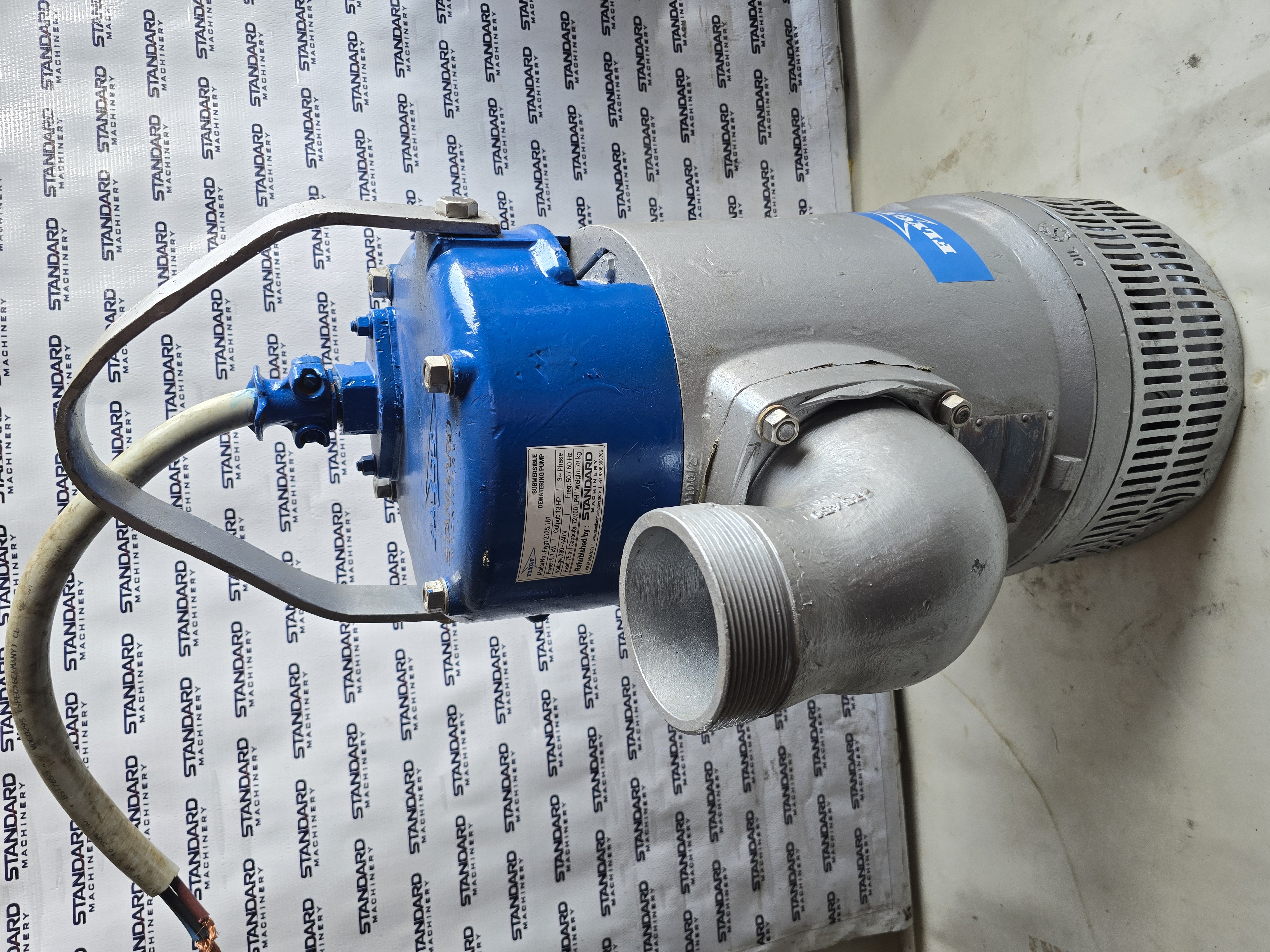 Flygt 2125.181 13 HP high head submersible dewatering pump with discharge elbow, 3 inch threaded outlet and lifting bail, Standard Machinery